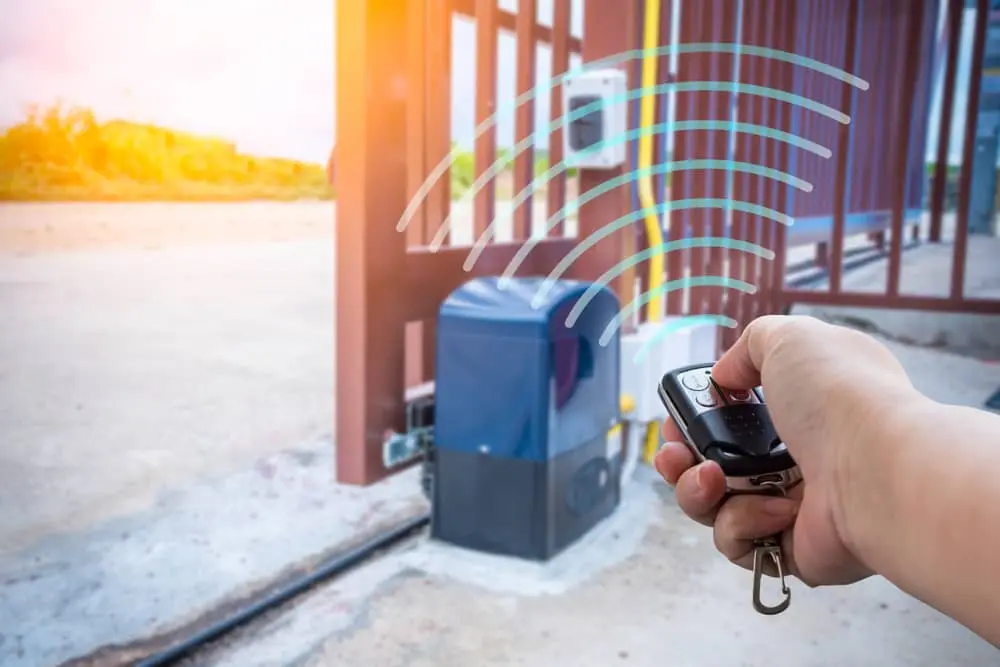 Gate with electric motor and gate key